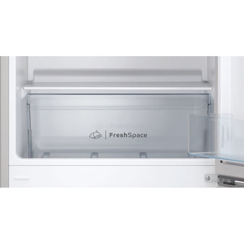 Close-up of the storage drawer inside the Indesit IB55 532 S UK silver fridge freezer