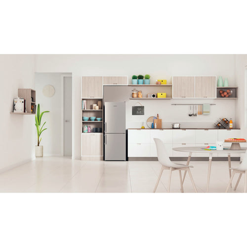 Indesit IB55 532 S UK silver fridge freezer in a kitchen setting